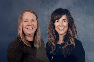 Under the leadership of Director of Student Services Michelle Theberge (right) and Assistant Director of Student Services Stacie Kittel-Godin, special educators across the rural district are more consistent in writing standards-aligned IEP goals.