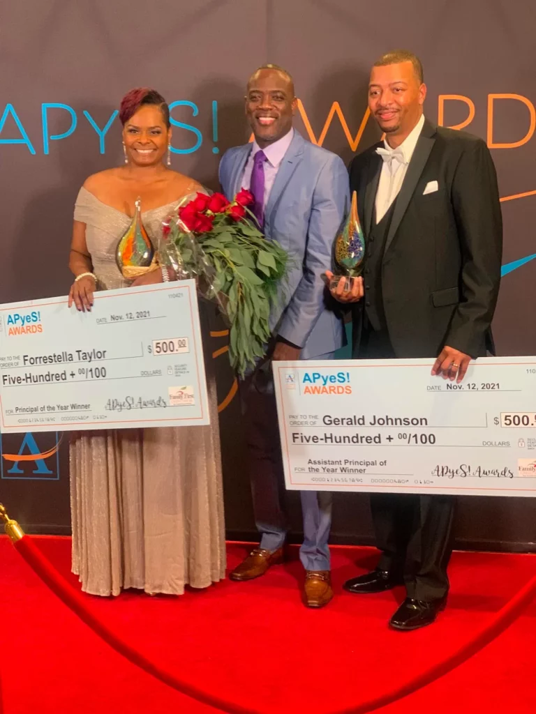 Atlanta Public School District Awards Ceremony with Forrestella Taylor (Principal of the Year), Tommy Usher (Associate Superintendent), and Gerald Johnson (Assistant Principal of the Year).