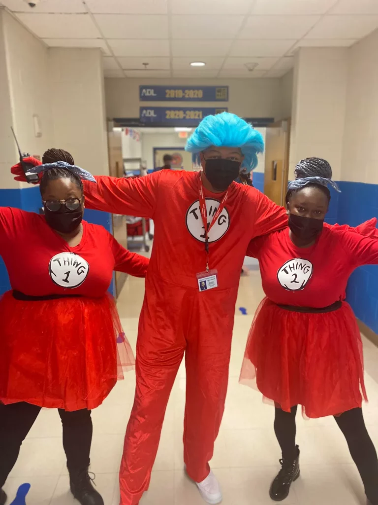 When Gerald was a principal, he and fellow educators dressed up for Book Character Day. From left to right: Yasmine Pitts (teacher), Gerald, and Karmen Simmons (teacher).