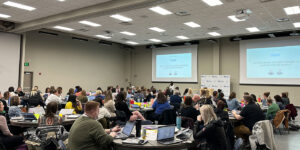 Special education teachers collaborating on IEP goals using Goalbook Toolkit in North Dakota
